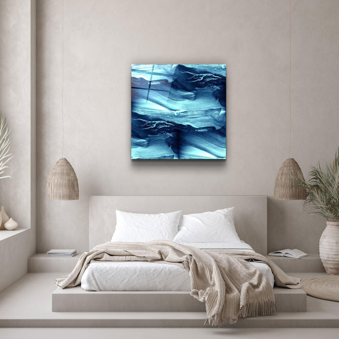 Abstract waves glass wall art by Artdesigna featuring flowing blue and clear glass with textured wave patterns.