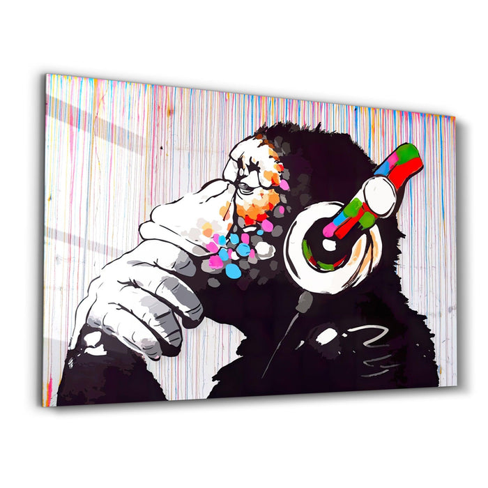 Banksy Monkey Beat glass wall art by Artdesigna featuring striking street art design on clear glass panel.