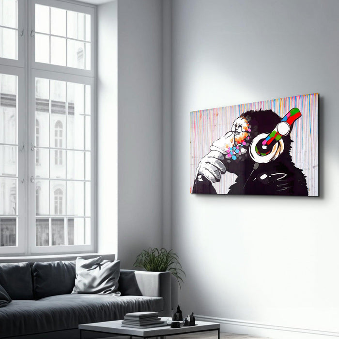 Banksy Monkey Beat glass wall art by Artdesigna featuring a striking monkey design on clear glass.