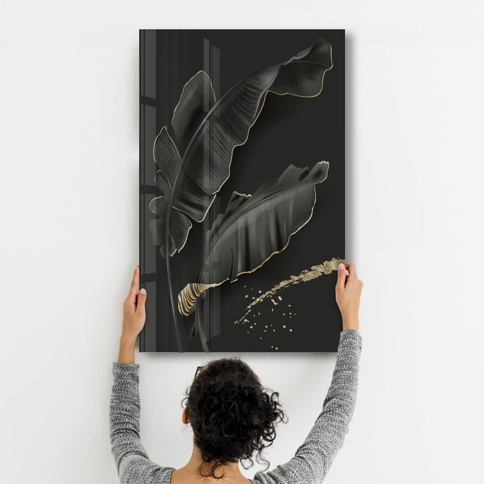 Black and gold feather glass wall art by Artdesigna, featuring intricate design and reflective glass surface for elegant wall decor.