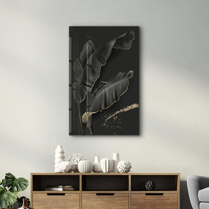 Black and gold feather glass wall art by Artdesigna featuring intricate feather design on clear glass background.