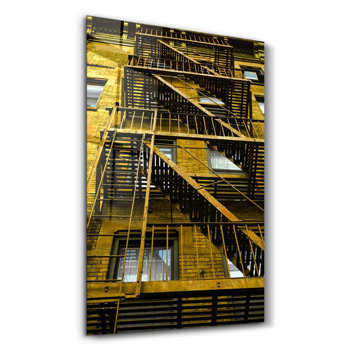 Colorful apartments glass wall art by Artdesigna featuring vibrant, abstract cityscape design for modern interior decor.