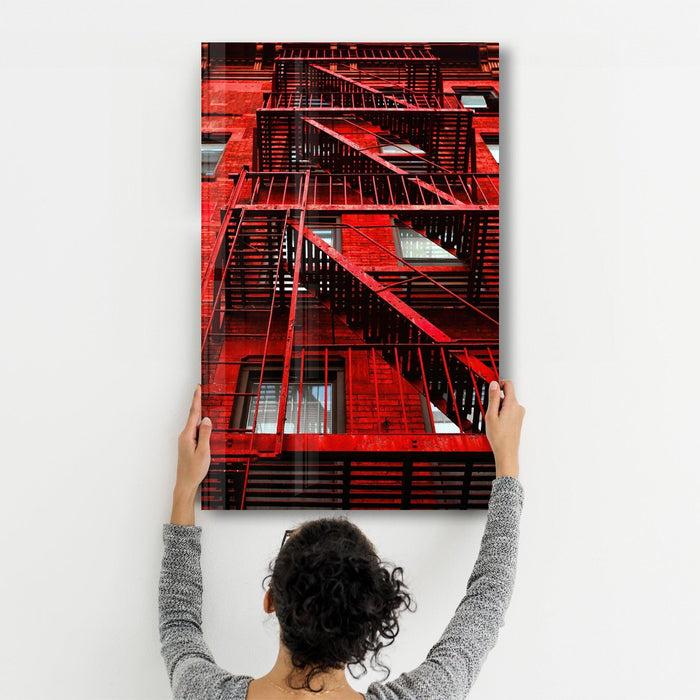 Colorful apartments glass wall art by Artdesigna featuring vibrant, abstract cityscape design on clear glass.