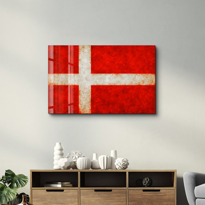 Glass wall art featuring a Denmark flag splash design by Artdesigna, 16x10 inches, with vibrant colors and modern style.
