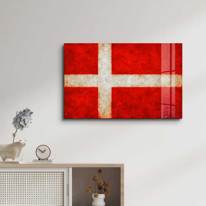 Glass wall art featuring a Denmark flag splash design by Artdesigna, 16x10 inches, vibrant and decorative wall decor.