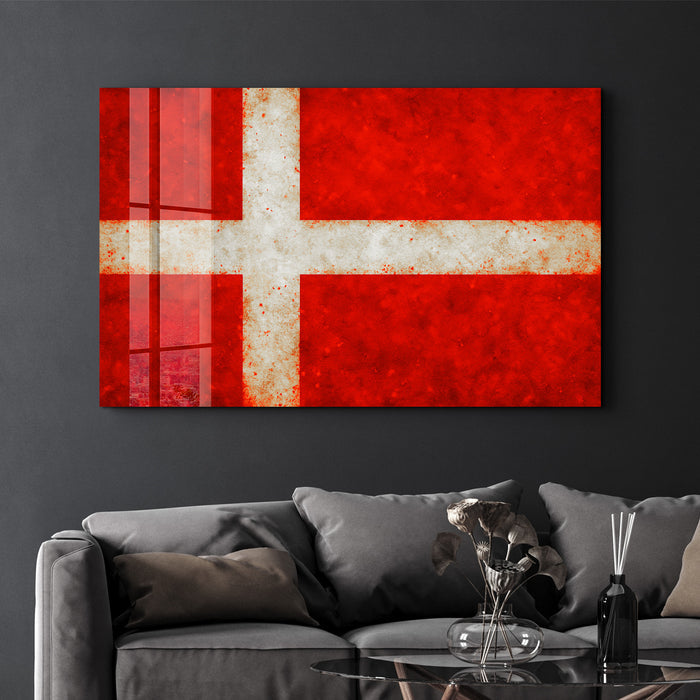 Glass wall art featuring a Denmark flag splash design by Artdesigna, 16x10 inches, decorative glass wall decor.
