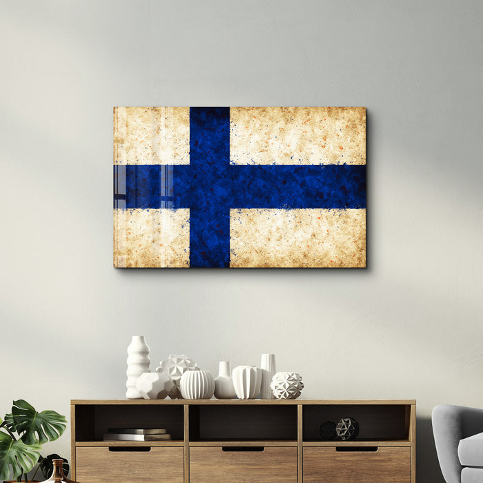 Finland Flag Splash glass wall art by Artdesigna, colorful splash design on clear glass panel for wall decoration.