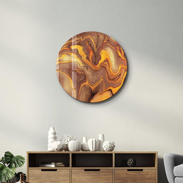 Golden Dust rounded glass wall art by Artdesigna featuring swirling gold accents on clear glass surface.