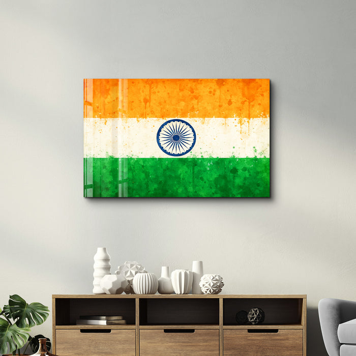 Glass wall art featuring an India flag splash design by Artdesigna, showcasing vibrant colors and artistic glass craftsmanship.