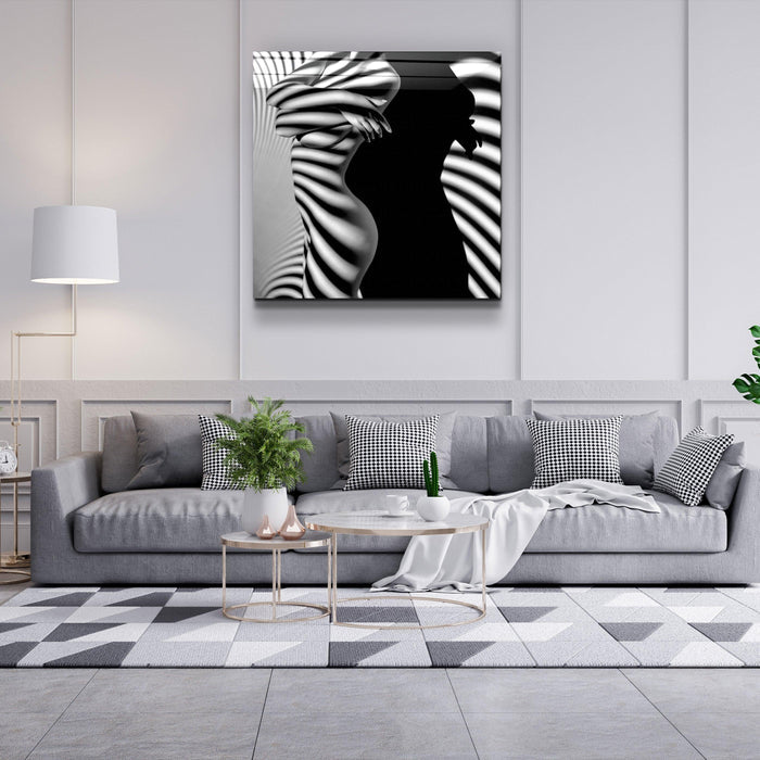 Elegant glass wall art titled Naked Shadows by Artdesigna featuring abstract shadow-inspired design on clear glass surface.