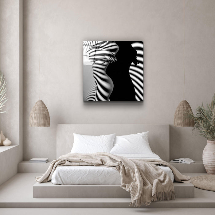Elegant glass wall art by Artdesigna featuring abstract naked shadows design on clear glass surface.