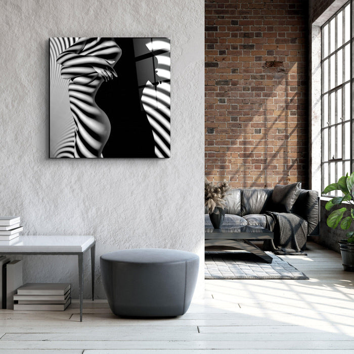 Elegant glass wall art by Artdesigna featuring abstract shadows and intricate designs for modern home decor.