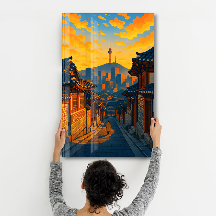 Seoul Glow glass wall art by HMZ, featuring vibrant cityscape design on clear glass, ideal for modern interior decor.