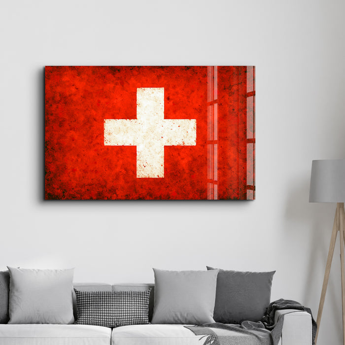 Switzerland Flag Splash glass wall art by Artdesigna showing vibrant red and white Swiss flag design on clear glass surface.