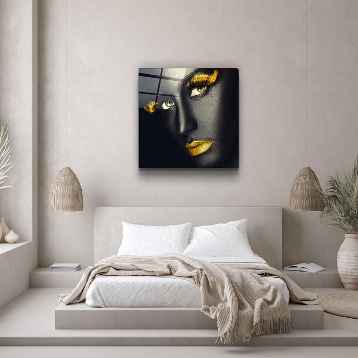 Yellow lips and eyes glass wall art by Artdesigna, featuring vibrant yellow lips and eyes on a sleek glass panel.