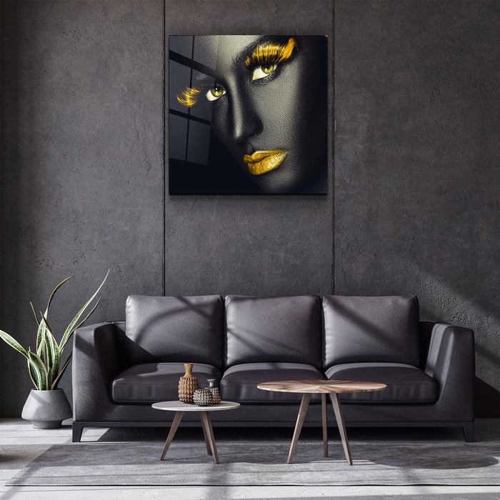 Yellow lips and eyes glass wall art by Artdesigna, featuring vibrant abstract face design on clear glass background.