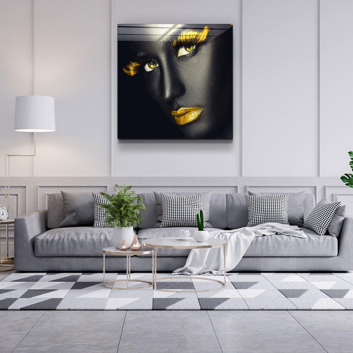 Yellow lips and eyes glass wall art by Artdesigna, featuring bold yellow facial features on clear glass.